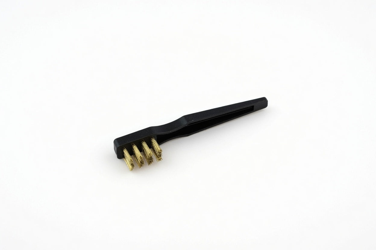 Spackle Hack™ metal wire brush for cleaning drill bit and sanding block between repairs